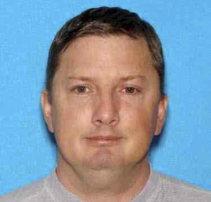 
              This undated Oregon driver identification photo released Monday, July 27, 2015, by the Charleston, W. Va., Police Department shows Neal Falls, of Springfield, Ore., killed by a women he attacked on July 18 in Charleston. Police are investigating whether Falls had any connection to cases of suspicious deaths and missing women in other states. (Oregon DMV/Charleston Police Department via AP)
            