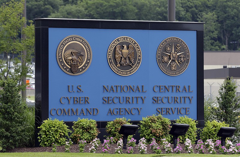 
              FILE - In this June 6, 2013, file photo, a sign stands outside the National Security Administration (NSA) campus on in Fort Meade, Md. The Obama administration has decided that the National Security Agency will soon stop using millions of American calling records it collected under a controversial program leaked by former agency contractor Edward Snowden. The Director of National Intelligence said July 27,  that as of Nov. 29, those records would no longer be examined in terrorism investigations, and would be destroyed as soon as possible. (AP Photo/Patrick Semansky, File)
            