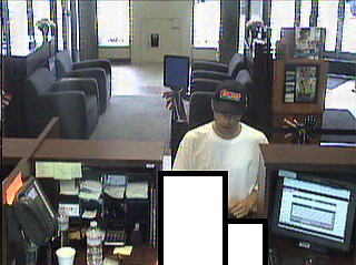 Surveillance photo of Highway 58 First Tennessee Bank robbery suspect.