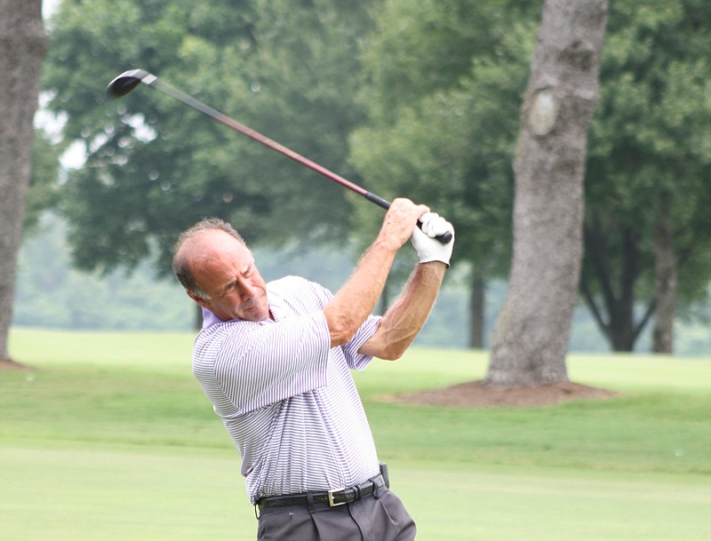 Neil Spitalny, from Chattanooga, hits a ball at the 2013 State Amateur Golf Tournament held at Chattanooga Golf and Country Club. 