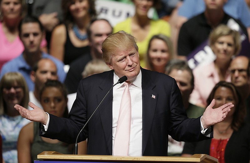 Republican presidential candidate Donald Trump speaks at a rally and picnic in Oskaloosa, Iowa. (AP Photo/Charlie Neibergall)