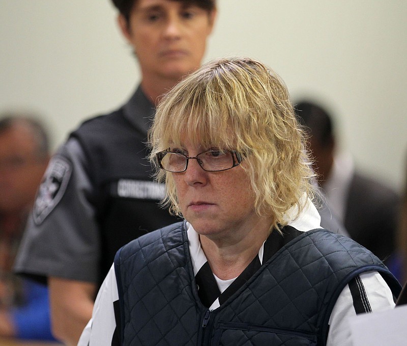
              FILE - In this June 15, 2015, file photo, Joyce Mitchell appears before Judge Mark Rogers in Plattsburgh, N.Y., City Court for a hearing. The New York prison worker accused of smuggling hacksaw blades in frozen hamburger meat to two killers who later broke out and spent more than two weeks on the run will face charges in court and will be arraigned on Tuesday, July 28, 2015. (G.N. Miller/New York Post via AP, Pool, File)
            
