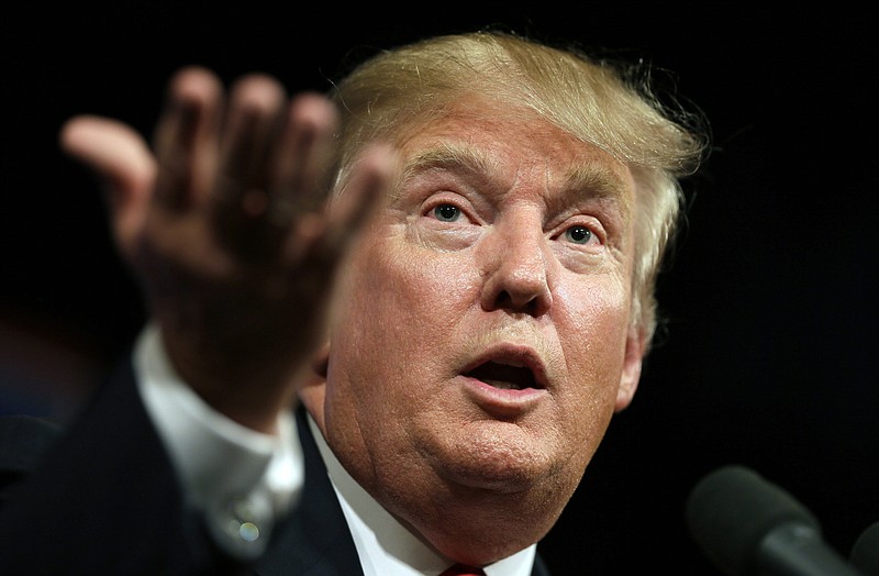 In this June 16, 2015, file photo, Republican presidential candidate Donald Trump speaks to supporters during a rally in Des Moines, Iowa.