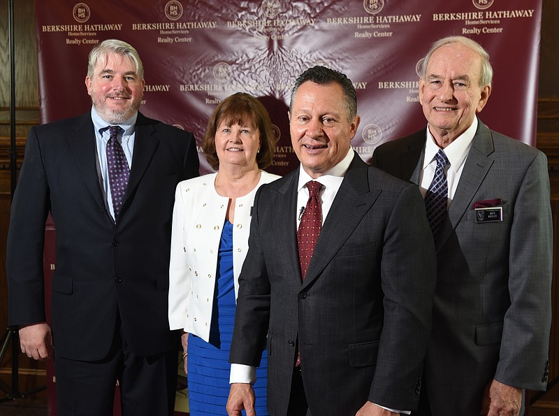Byron Kelly, left, Karen Kelly, Gino Blefari and Ben Kelly were featured at Wednesday's gathering of local Berkshire Hathaway realtors in the ballroom at Chattanooga Golf and Country Club.