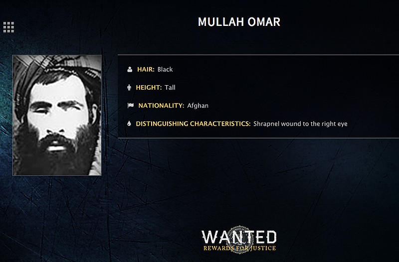 In this undated image released by the FBI, Mullah Omar is seen in a wanted poster. An Afghan official says his government is examining claims that reclusive Taliban leader Mullah Omar is dead. The Taliban could not be immediately reached for comment on the government's comments about Omar, who has been declared dead many times before. 