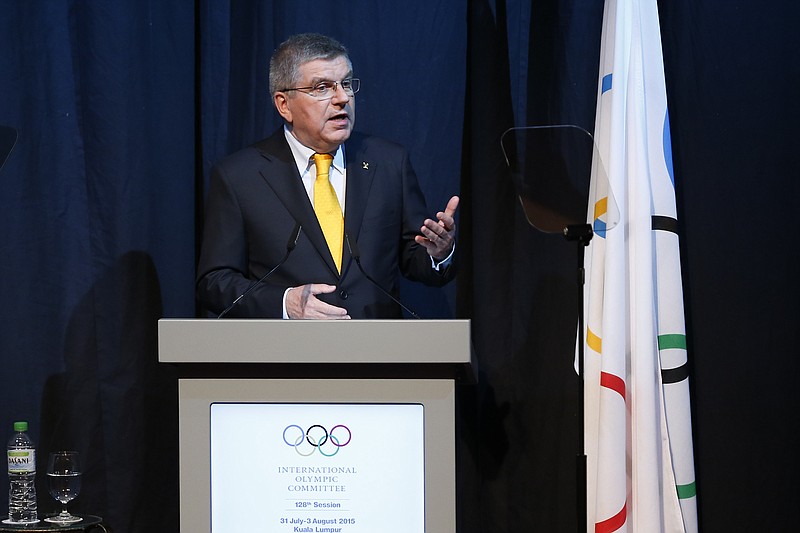 
              President of the International Olympic Committee (IOC) Thomas Bach, speaks during the opening ceremony of IOC in Kuala Lumpur, Malaysia,Thursday, July 30, 2015. Malaysia is hosting the 128th International Olympic Committee executive board meeting where the vote for the host cities of the 2022 Olympic Winter Games and for the 2020 Youth Olympic Winter Games will take place. (AP Photo/Vincent Thian)
            
