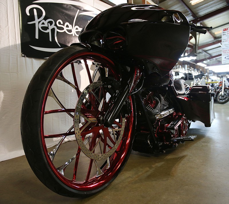 
              "Perseverance", a custom-built motorcycle designed and built by Tim Martin, Scottie Hubbard and Chris Elliott is seen in the garage at Steel Syndicate Chop Shop on Skyland Boulevard in Tuscaloosa, Ala. on Wednesday July 29, 2015. (Erin Nelson/The Tuscaloosa News via AP) NO SALES
            