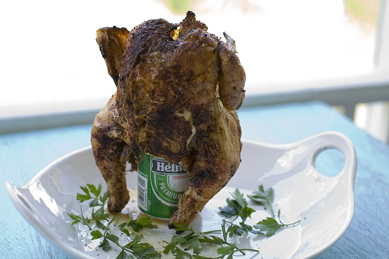 In this image taken on July 30, 2012, a recipe for beer can chicken is shown in Concord, N.H. (AP Photo/Matthew Mead)