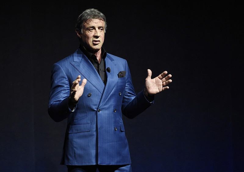 
              FILE - In this April 21, 2015 file photo, Sylvester Stallone introduces a clip from the film "Creed" at the Warner Bros presentation during CinemaCon 2015, at Caesars Palace, in Las Vegas. The actor performs as Rocky Balboa in “Creed,” opening in Nov. 2015. (Photo by Chris Pizzello/Invision/AP, File)
            