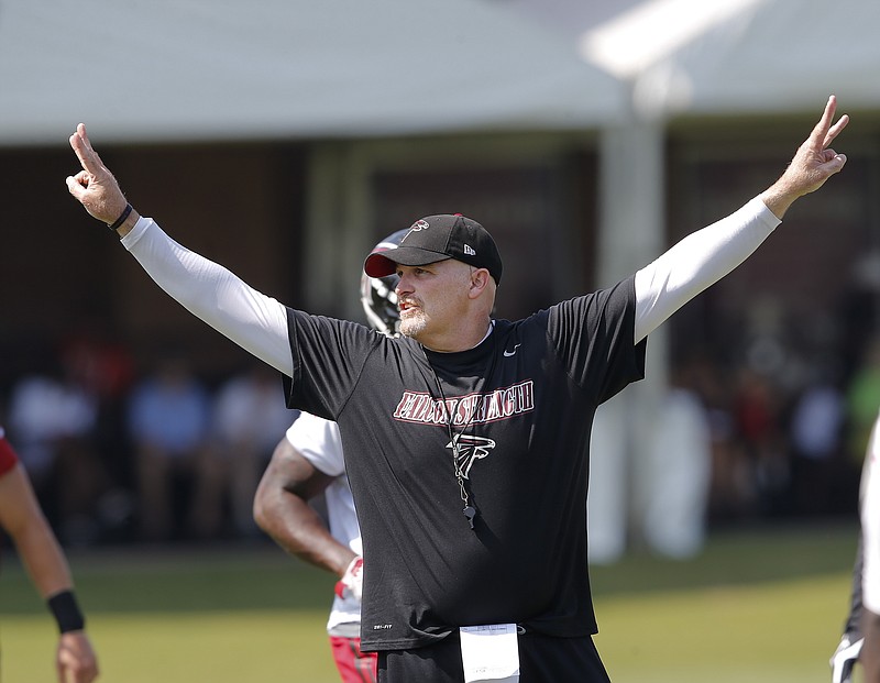 Dan Quinn, who is in his first season as head coach of the Atlanta Falcons, led his new team through the first day of training camp Friday in Flowery Branch, Ga.
