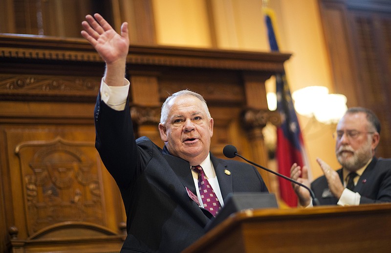 Georgia House Speaker David Ralston waves after being re-elected on the first day of the legislative session in the House Chamber of the State Capitol on Monday, Jan. 12, 2015, in Atlanta.
