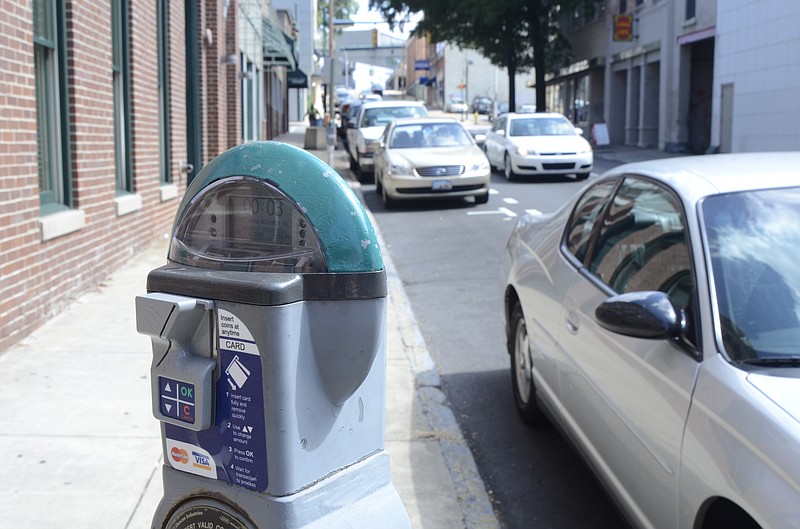A parking meter stands ready to take money on 7th Street in Chattanooga in this 2013 file photo.
