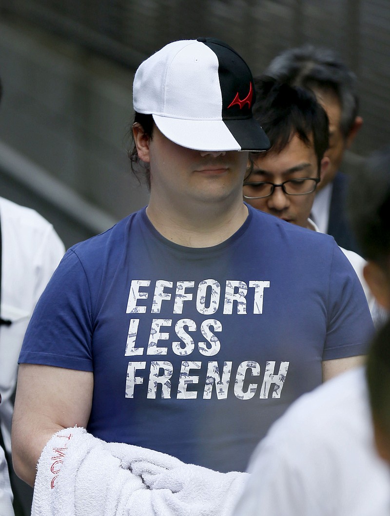 
              Japan police arrest Mark Karpeles, the Mt. Gox CEO on Saturday, Aug. 1, 2015, in Tokyo. Karpeles, was arrested Saturday on suspicion of inflating his cash account by $1 million. Karpeles’ lawyer told the Kyodo News service that his client denies wrongdoing. (AP Photo/Kyodo News) JAPAN OUT, MANDATORY CREDIT
            