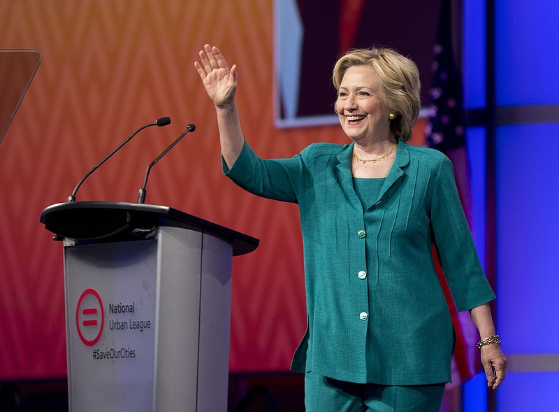 
              Democratic presidential candidate Hillary Rodham Clinton waves as she is introduced before speaking to the National Urban League, Friday, July 31, 2015, in Fort Lauderdale, Fla. (AP Photo/Wilfredo Lee)
            