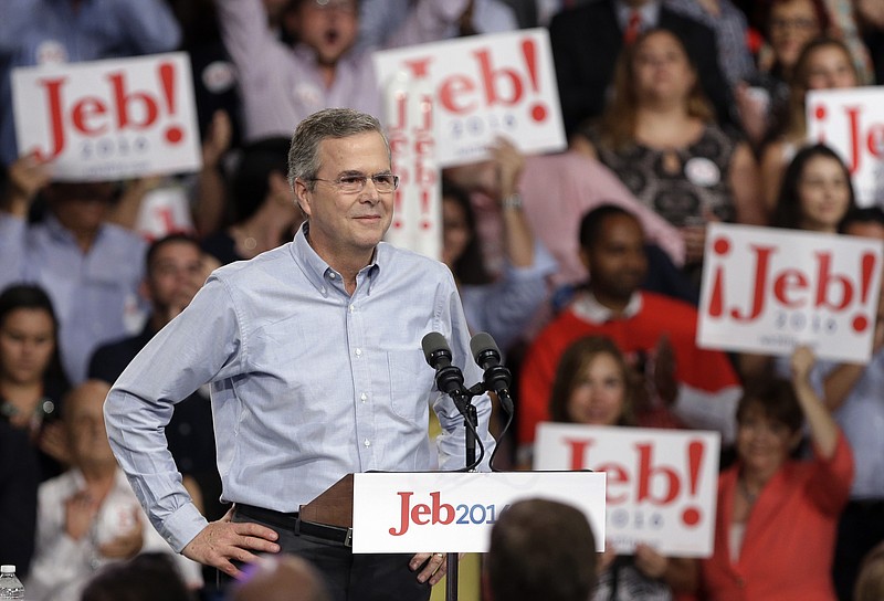 
              In this photo taken K=June 15, 2015, former Florida Gov. Jeb Bush stands on the stage before  announcing his bid for the Republican presidential nomination, at Miami Dade College in Miami. In his first Spanish-language television network interview since launching his 2016 presidential campaign, Republican presidential candidate Jeb Bush fielded a wide range of questions, from the upcoming GOP debate to Donald Trump, from Latin American foreign policy to his taste in music, and whether he had ever experienced discrimination. (AP Photo/Lynne Sladky)
            
