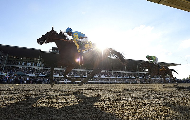 American Pharoah, with jockey Victor Espinoza in the saddle, won Sunday's Haskell Invitational at Monmouth Park in Oceanport, N.J. It was the horse's first race since winning the Triple Crown earlier this summer.