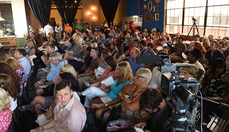 Attendees listen to presentations of innovative ideas for education during the Teacherpreneur Incubator event at the Granfaloon on Main Street on Sunday in Chattanooga. Five of the 21 projects pitched during the event received cash awards.