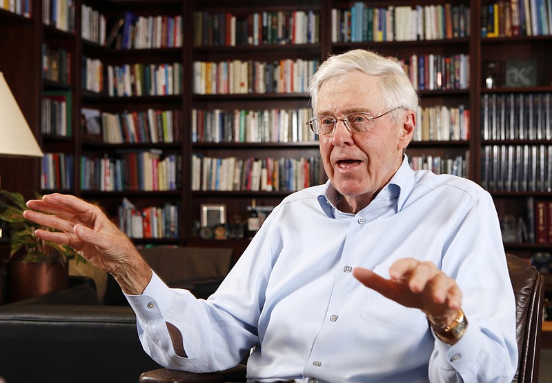 
              FILE- In this May 22, 2012, file photo, Charles Koch speaks in his office at Koch Industries in Wichita, Kan. Koch, a billionaire industrialist, warned America is "done for" if the conservative donors and politicians he gathered at a retreat this weekend don't rally others to their cause of demanding a smaller, less-intrusive government. (Bo Rader/The Wichita Eagle via AP, File) LOCAL TELEVISION OUT; MAGS OUT; LOCAL RADIO OUT; LOCAL INTERNET OUT; MANDATORY CREDIT
            