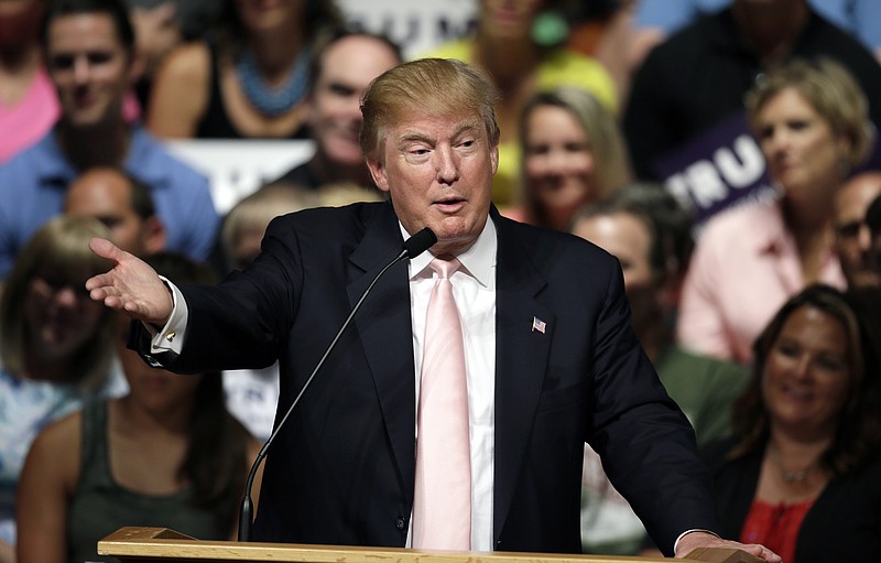 
              FILE - In this July 25, 2015 file photo, Republican presidential candidate Donald Trump speaks in Oskaloosa, Iowa. Trump, widely believed to the be the wealthiest American ever to run for president, is nowhere among the ranks of the country’s most generous citizens, according to an Associated Press review of his financial records and other government filings. (AP Photo/Charlie Neibergall, File)
            
