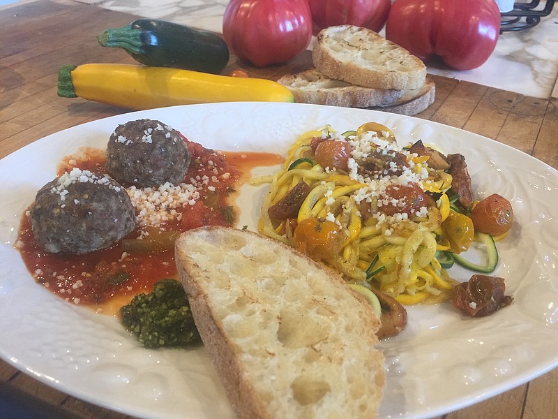 Fresh shoestring cut zucchini, or "zoodles," makes for a healthy and tasty dish. We roasted ours with tomatoes, mushrooms, shallots and olive oil and served with lamb meatballs over a tomato sauce and ciabatta bread.