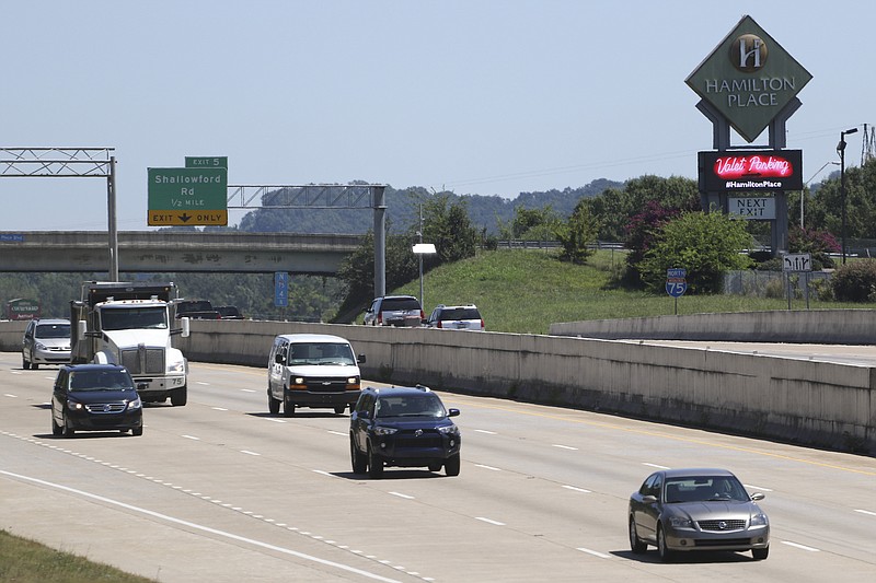 Motorists travel southbound past the Shallowford Road exit and Hamilton Place mall on Monday.