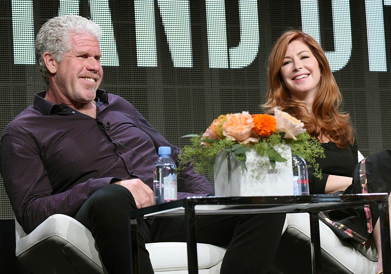 
              Ron Perlman, left, and Dana Delany participate in the "Hand of God" panel at the Amazon Summer TCA Tour at the Beverly Hilton Hotel Monday, Aug. 3, 2015, in Beverly Hills, Calif. (Photo by Richard Shotwell/Invision/AP)
            