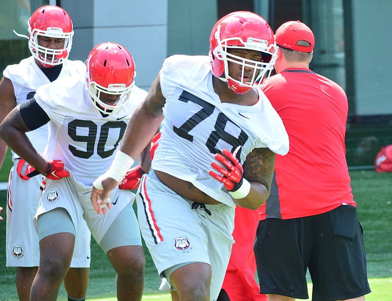 Defensive tackle Trenton Thompson, the top prospect nationally in the 2015 signing class, went through his first practice Tuesday with the Georgia Bulldogs.