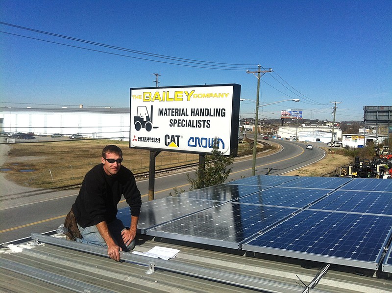 A LightWave Solar worker displays one of the solar installations the company has installed for The Bailey Co. Collectively, Bailey has put up solar panels that can generate up to 117 kilowatts at their facilities in Nashville, Tullahoma and Cookeville. Installation will soon begin at The Bailey Co., facility in Cleveland, Tenn.Providers program.