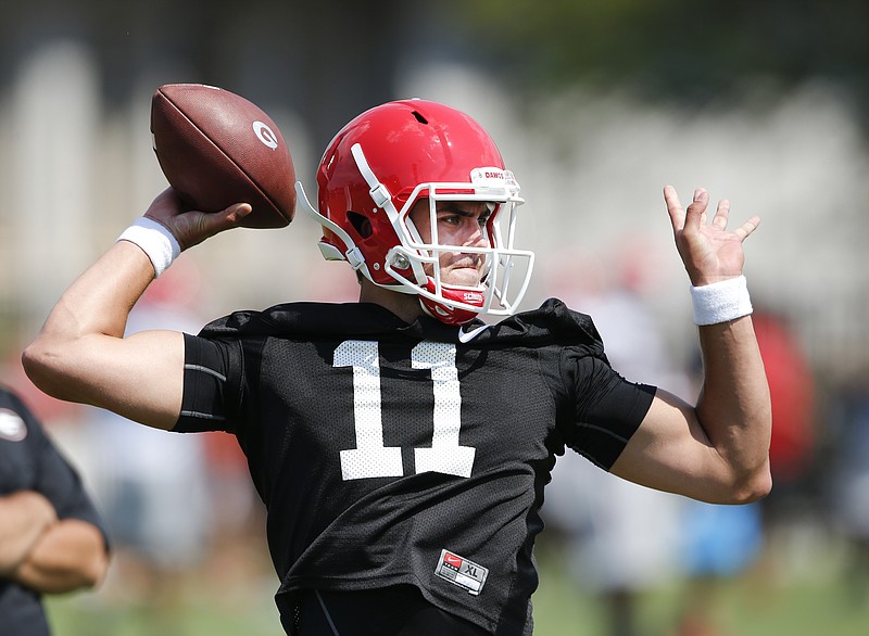 Georgia quarterback Greyson Lambert works during a college football practice Tuesday, Aug. 4, 2015, in Athens, Ga.