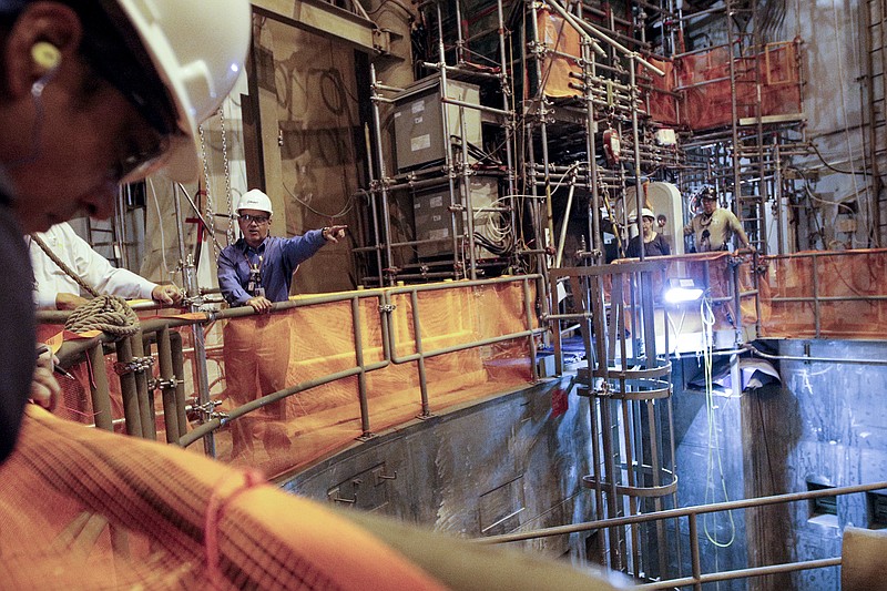 Senior vice president of operations and construction Mike Skaggs stands inside of the Unit 2 reactor containment during a tour of TVA's Watts Bar nuclear plant Wednesday, April 29, 2015, in Spring City, Tenn. TVA plans for the nuclear plant's second reactor unit to come online by the end of the year.