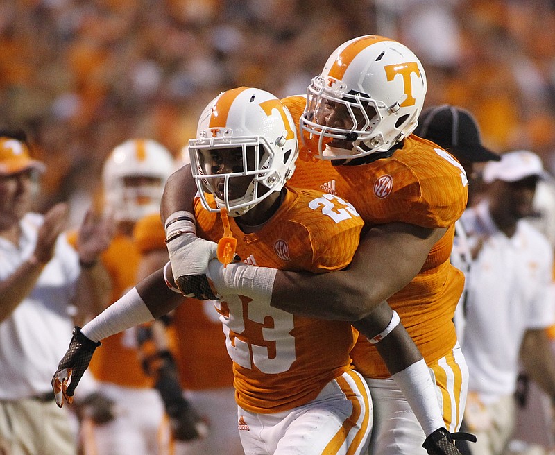 Tennessee defensive back Cameron Sutton, left, and defensive end Derek Barnett are proven standouts now for the Vols, and both are expected to be even better leaders this season.
