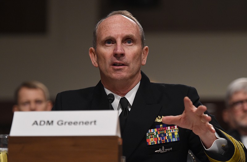 Chief of Naval Operations Adm. Jonathan Greenert listens on Capitol Hill in Washington, Tuesday, March 10, 2015, prior to testifying before the Senate Armed Services Committee hearing on the Navy's budget request for fiscal 2016 and future years defense program. (AP Photo/Molly Riley)