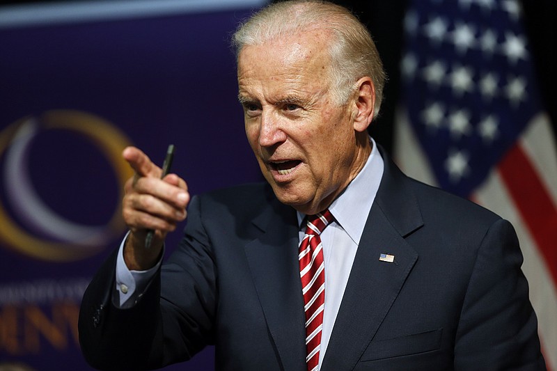 In this July 21, 2015, file photo, Vice President Joe Biden speaks during a roundtable discussion at the Advanced Manufacturing Center at Community College of Denver. Biden's associates have resumed discussions about a 2016 presidential run after largely shelving such deliberations during his son's illness and following his death earlier this year.