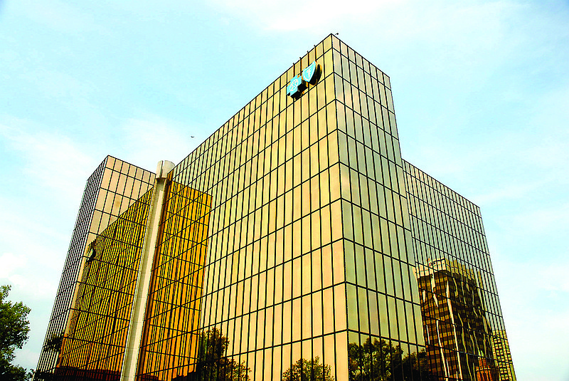 The Blue Cross/Blue Shield building at 801 Pine Street is one of three the insuror has for sale as work proceeds on the new offices atop Cameron Hill. The golden glass structure opened for business in 1970.
