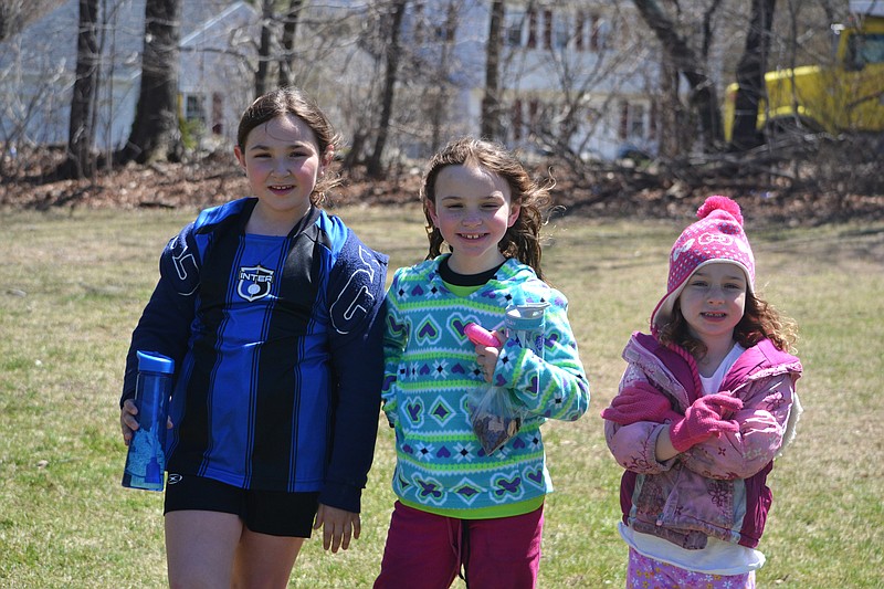 The McKearney girls — from left, Kelley, 9, Meghan, 7, and Diane, 4, are seen at soccer game at Nystrom's Park in Thomaston, Conn. While their mother, Amy is still on chauffeur duty to distant and busy roads, she has found lots of little ways to foster growing independence in her brood. "I let my oldest go to the park with my 4-year-old while I watch the 7-year-old play soccer," she offers. "It's about 100 yards away." (Amy McKearney via AP)