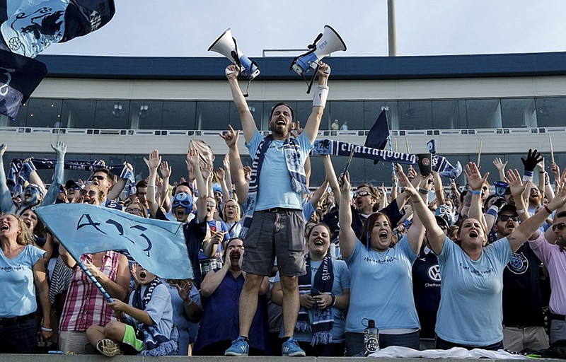 The Chattahooligans cheer before Chattanooga Football Club's NPSL national championship match against the New York Cosmos B on Saturday at Finley Stadium.