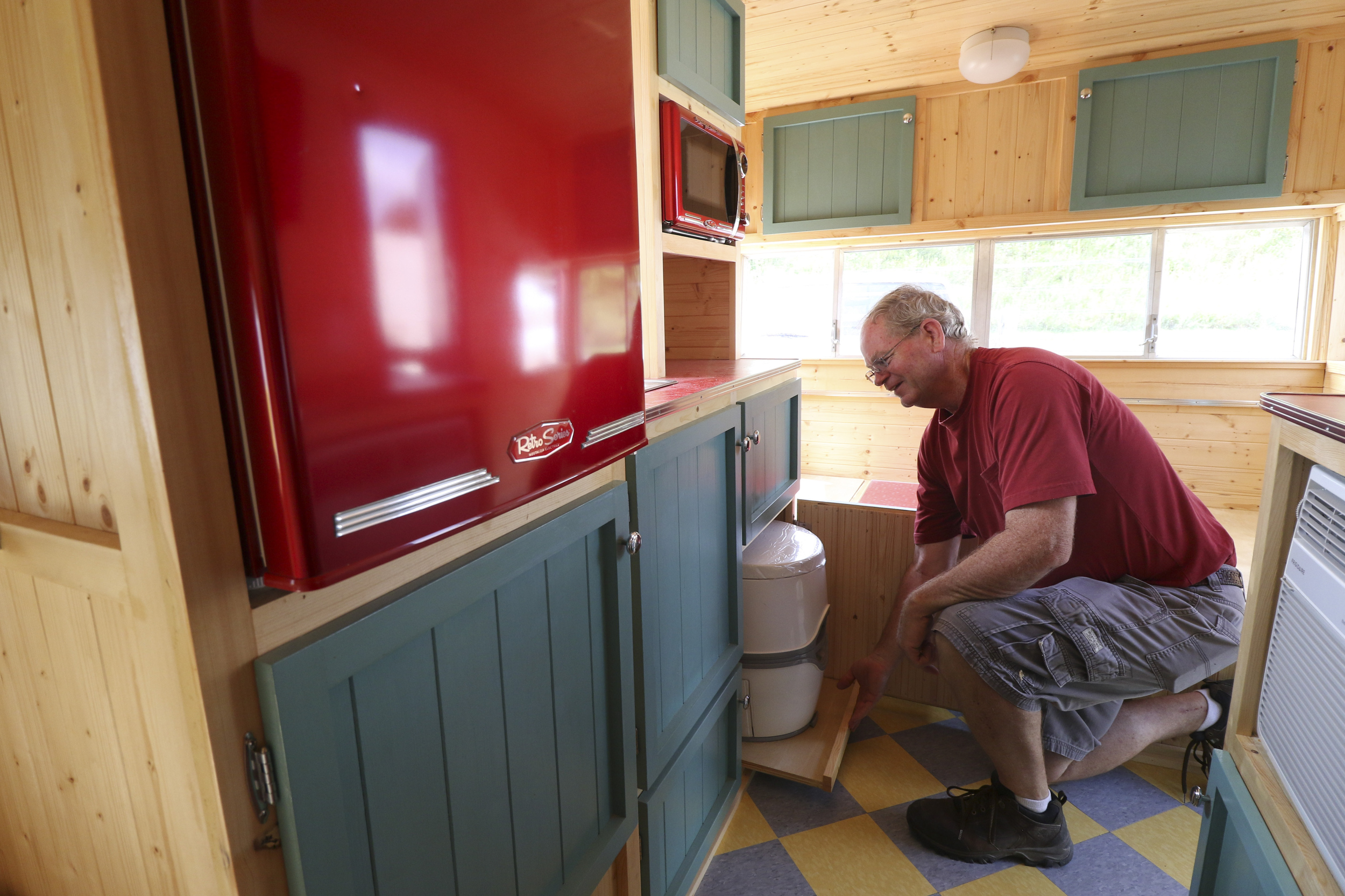 Daryl Bloodworth puts the final touches on a 1963 Shasta while at D.B. Vintage Campers in Rossville, Georgia, on July 30, 2015 before it is delivered to Birmingham.