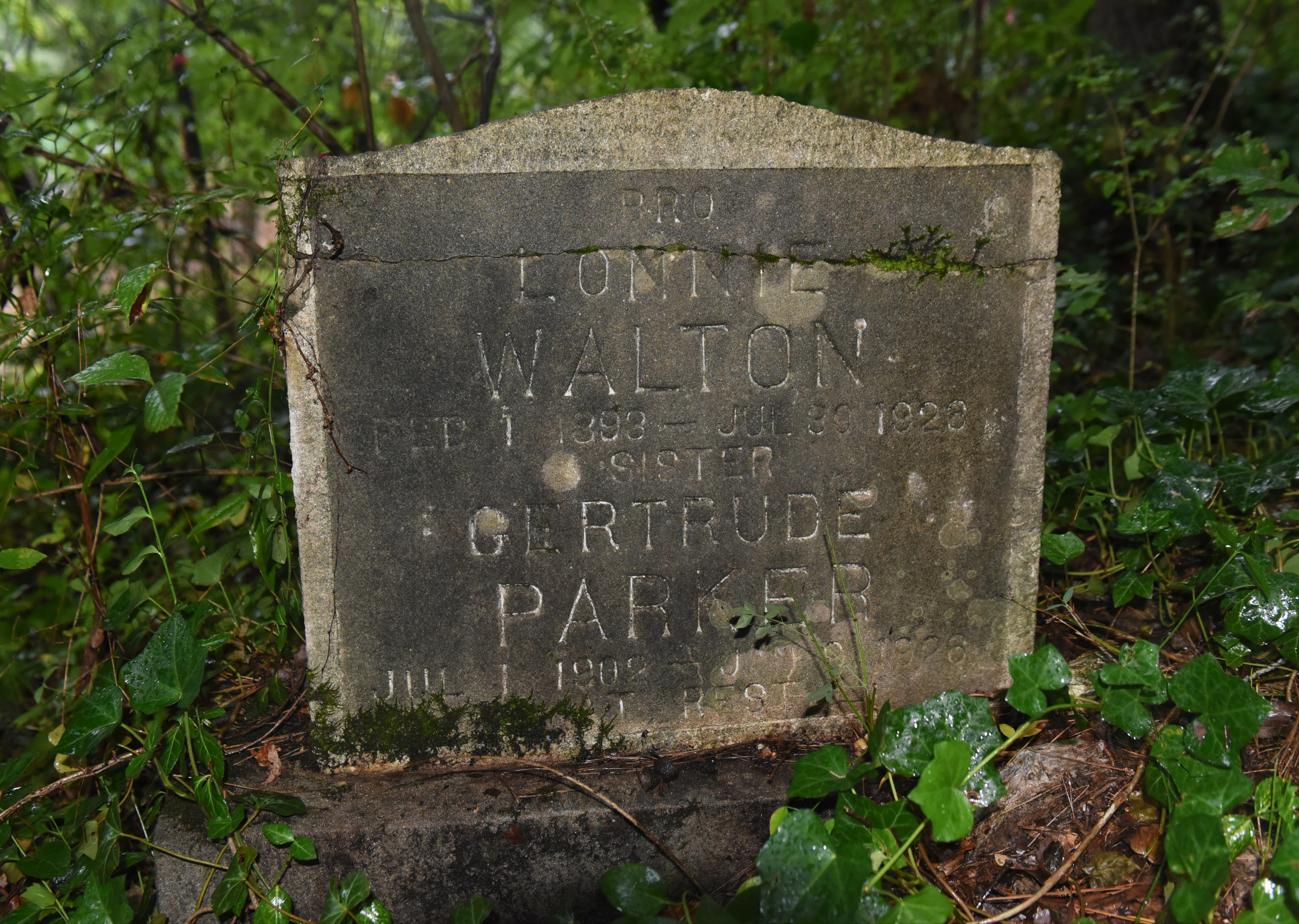 An old tombstone is seen at the site of an old cemetery located next to the construction site for a new housing development on Dartmouth Street in the North Chattanooga community Monday, Aug. 10, 2015, in Chattanooga, Tenn.