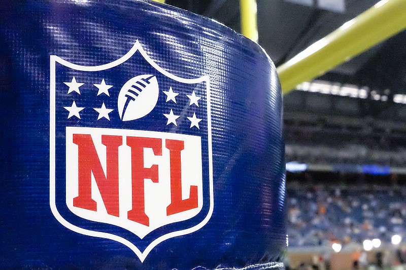 
              FILE - This Aug. 9, 2014 file photo shows an NFL logo on a goal post padding before a preseason NFL football game between the Detroit Lions and the Cleveland Browns at Ford Field in Detroit. In a two-year content and advertising deal announced Monday, Aug. 10, 2015, Twitter is huddling with the National Football League as it tackles the challenge of attracting a broader audience to its short messaging service. (AP Photo/Rick Osentoski, File)
            