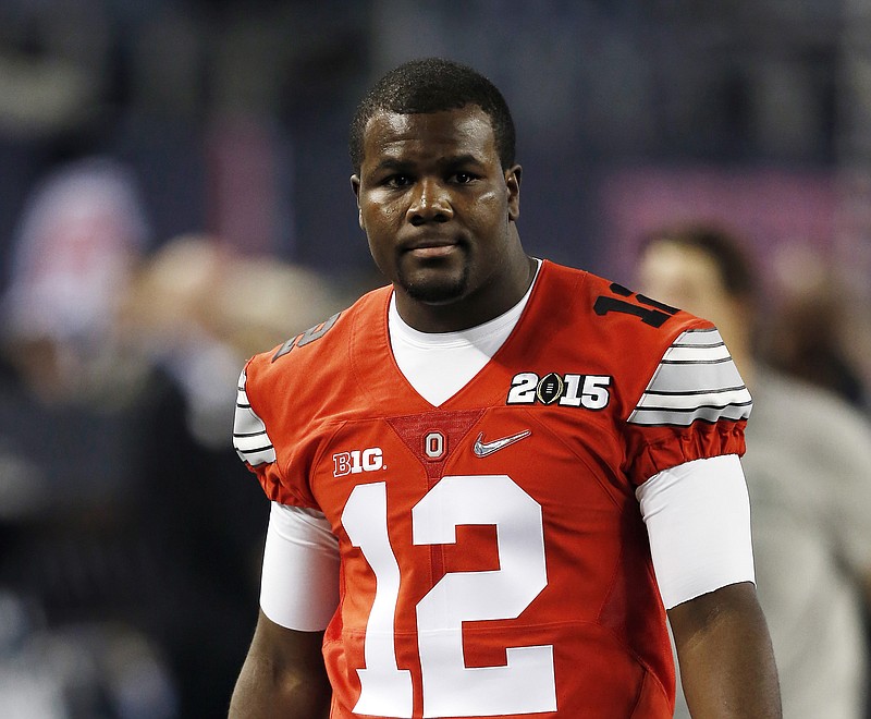 Ohio State's Cardale Jones warms up before the NCAA college football playoff championship game against Oregon on Monday, Jan. 12, 2015, in Arlington, Texas. 