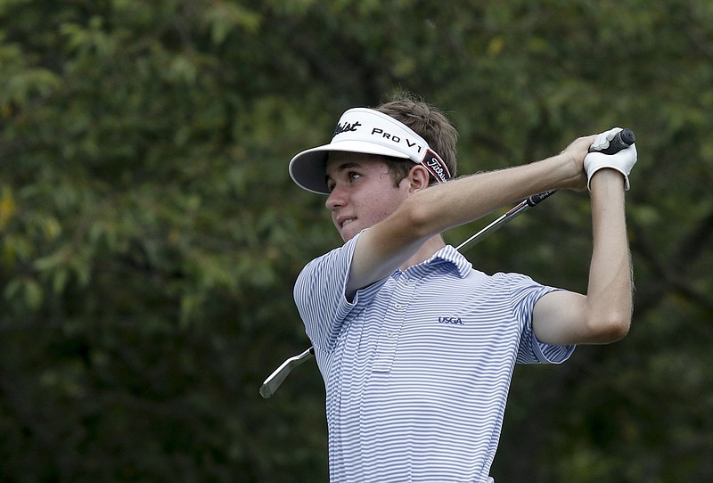Davis Shore of Knoxville, the 2014 Tennessee Junior Amateur champion, edged McCallie's Evan Spence in a playoff Tuesday for the championship of the Baylor Preview tournament.