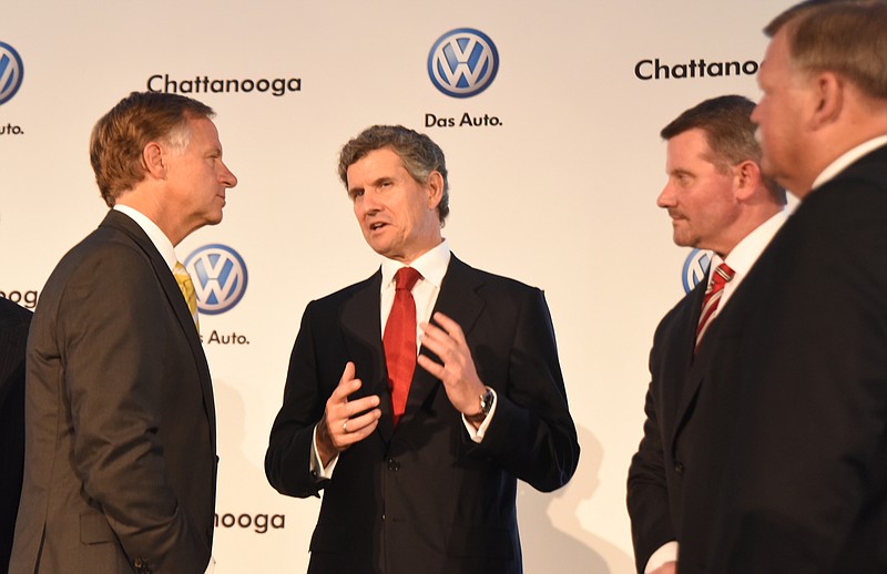 President and CEO of Gestamp, Francisco J. Riberas, second from left, talks with Gov. Bill Haslam, left, Gestamp North America President and CEO Jeff Wilson, second from right, and Hamilton County Mayor Jim Coppinger after a news conference.