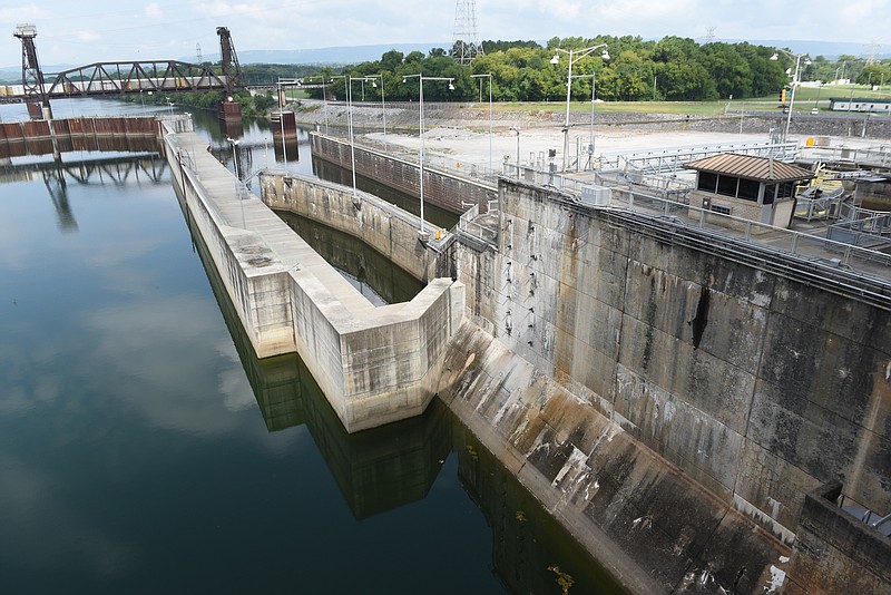The stalled replacement lock project at the Chickamauga Lock is seen at left next to the original lock on Tuesday, Aug. 11, 2015, in Chattanooga, Tenn.  