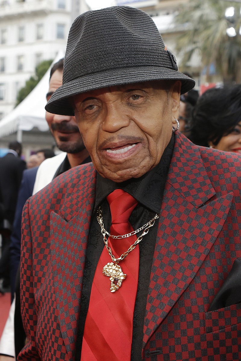 
              FILE - In this Tuesday, May 19, 2015, file photo, Joe Jackson poses for photographers as he arrives for the screening of the film Sicario at the 68th international film festival, Cannes, France. In a statement released Tuesday, Aug. 11, 2015, the Jackson family said they wanted to thank the Albert Einstein Hospital and its doctors in Sao Paulo, who have helped their father, Joe, who is recovering from a stroke. Jackson, 87, arrived in Sao Paulo in July and attended several events before falling ill. (AP Photo/Lionel Cironneau, File)
            