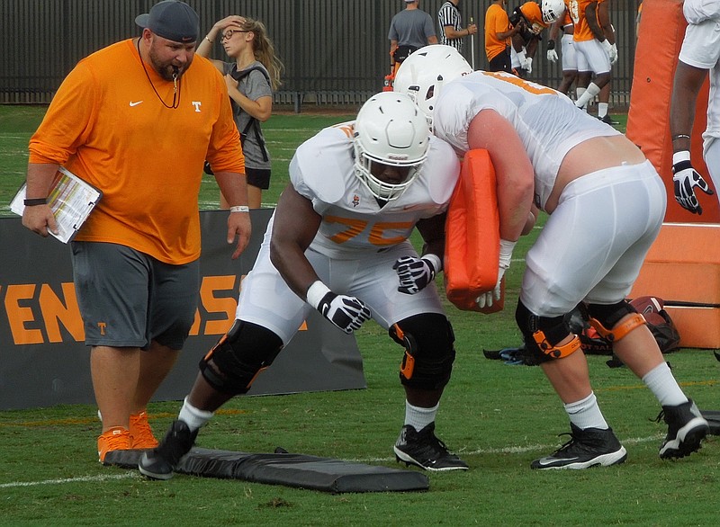 Tennessee's Marcus Jackson goes through a blocking drill during the Vols' practice at Haslam Field on Aug. 7, 2015.