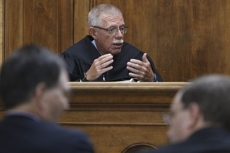 Judge Jon "Bo" Wood listens to the opening statements in a case against Thomas Blevins, a former Lakeview Middle School band teacher accused of having an inappropriate relationship with a student, during the first day of trial at the Catoosa County Courthouse on August 11, 2015. 