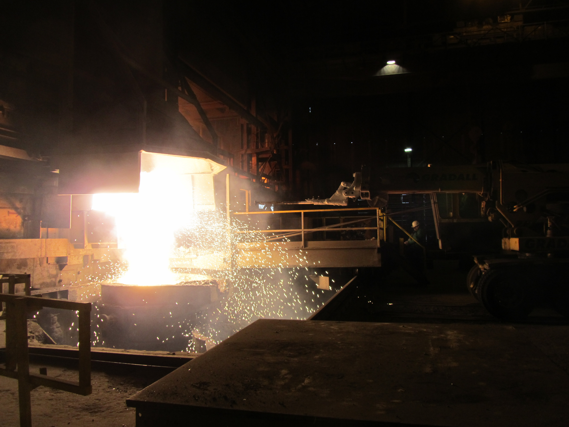 Potential Caption: Tapping the furnace at Tennessee Alloys Company, part of Globe Specialty Metals.