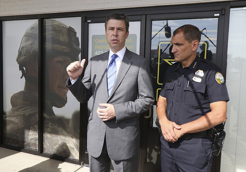Chattanooga Mayor Andy Berke and Police Chief Fred Fletcher speak to media outside of the Armed Forces Career Center off of Lee Highway on Tuesday, July 21, 2015 about the July 16, 2015 terror shootings.