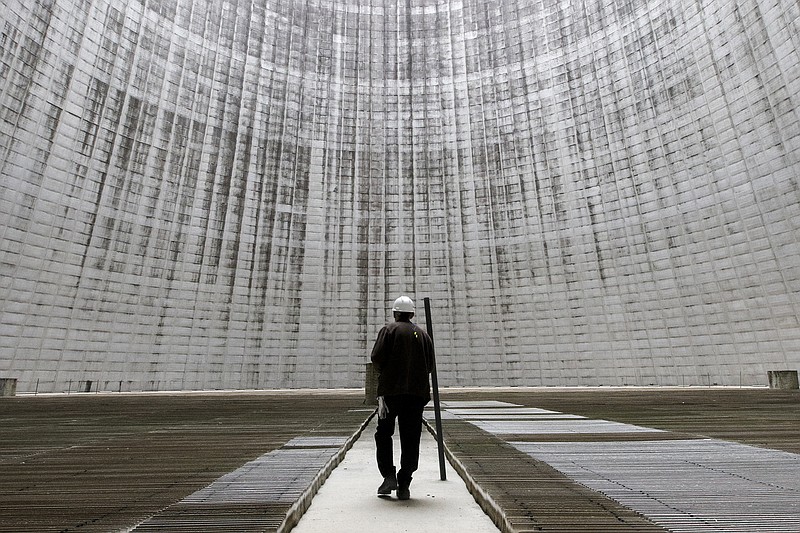 Unit 2 senior manager of operations Tom Wallace stands inside the unit 2 cooling tower of TVA's Watts Bar nuclear plant Wednesday, April 29, 2015, in Spring City, Tenn. 