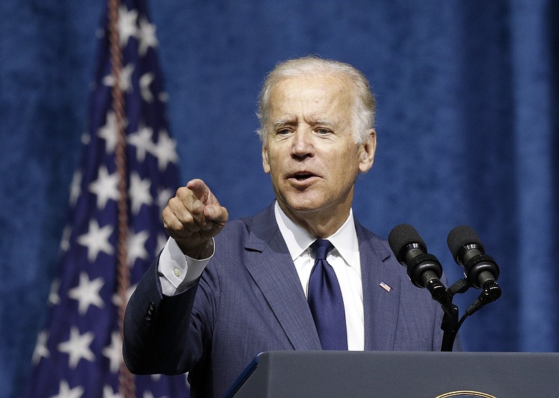 Vice President Joseph Biden speaks at a memorial for the five military servicemen killed in the July, 16, attacks on two military facilities held Saturday, Aug. 15, 2015, at McKenzie Arena in Chattanooga. Vice President Biden and Secretary of Defense Ash Carter spoke along with representatives from the U.S. Navy and Marine Corps.
